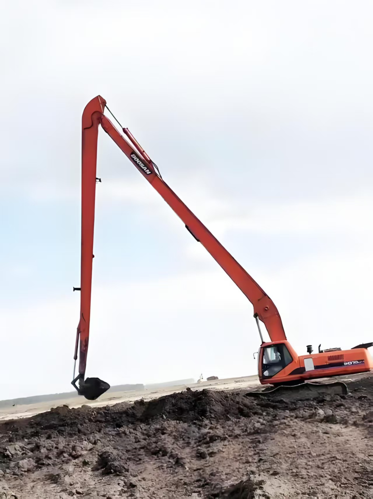 Long arm excavator